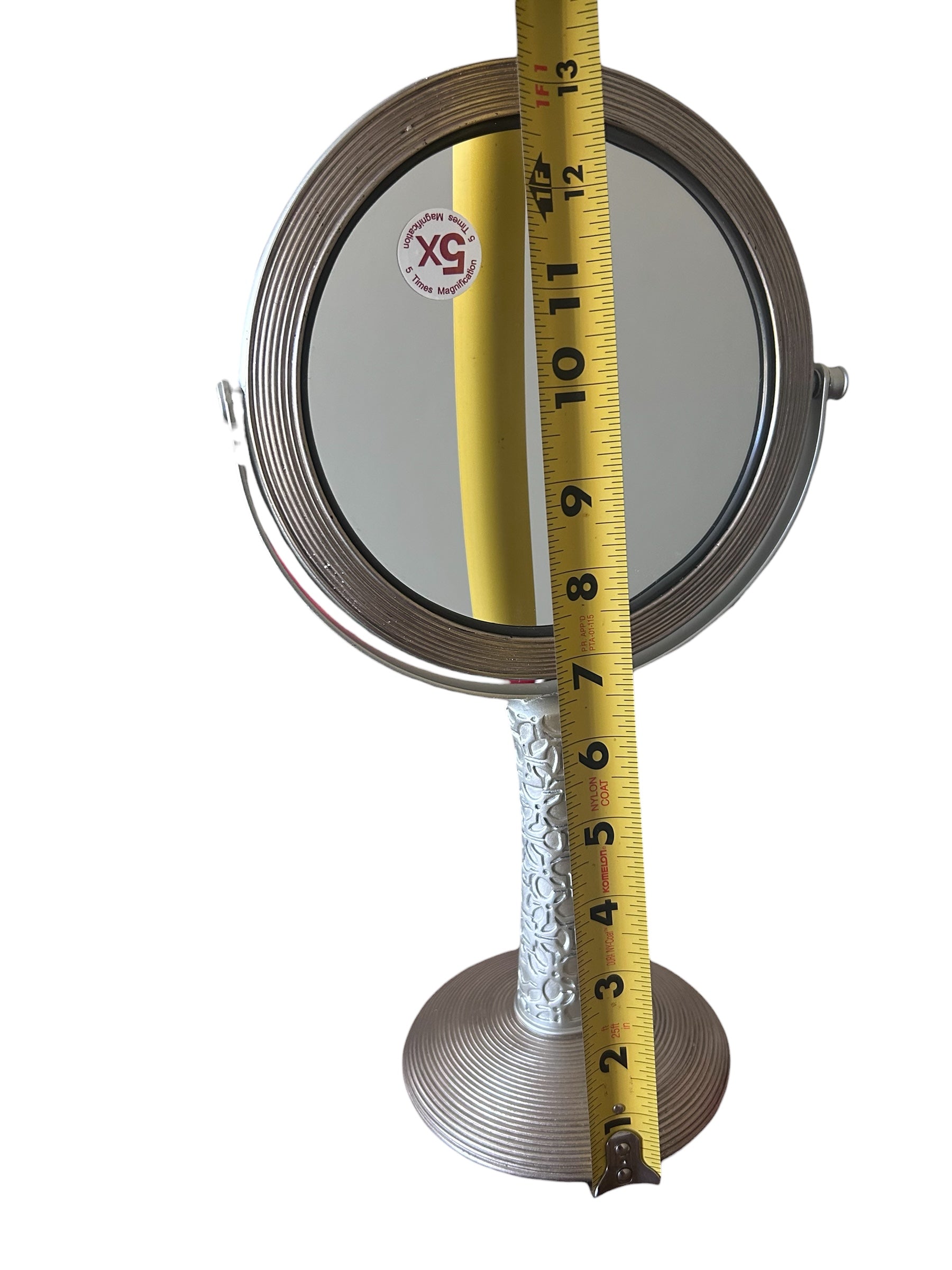 Makeup mirror. 2 sided. 1x/5x magnification. 13 inch tall. Metal/Silver tone