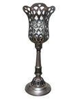 14.5 inch tall metal tea light candle holder. Silver tone.