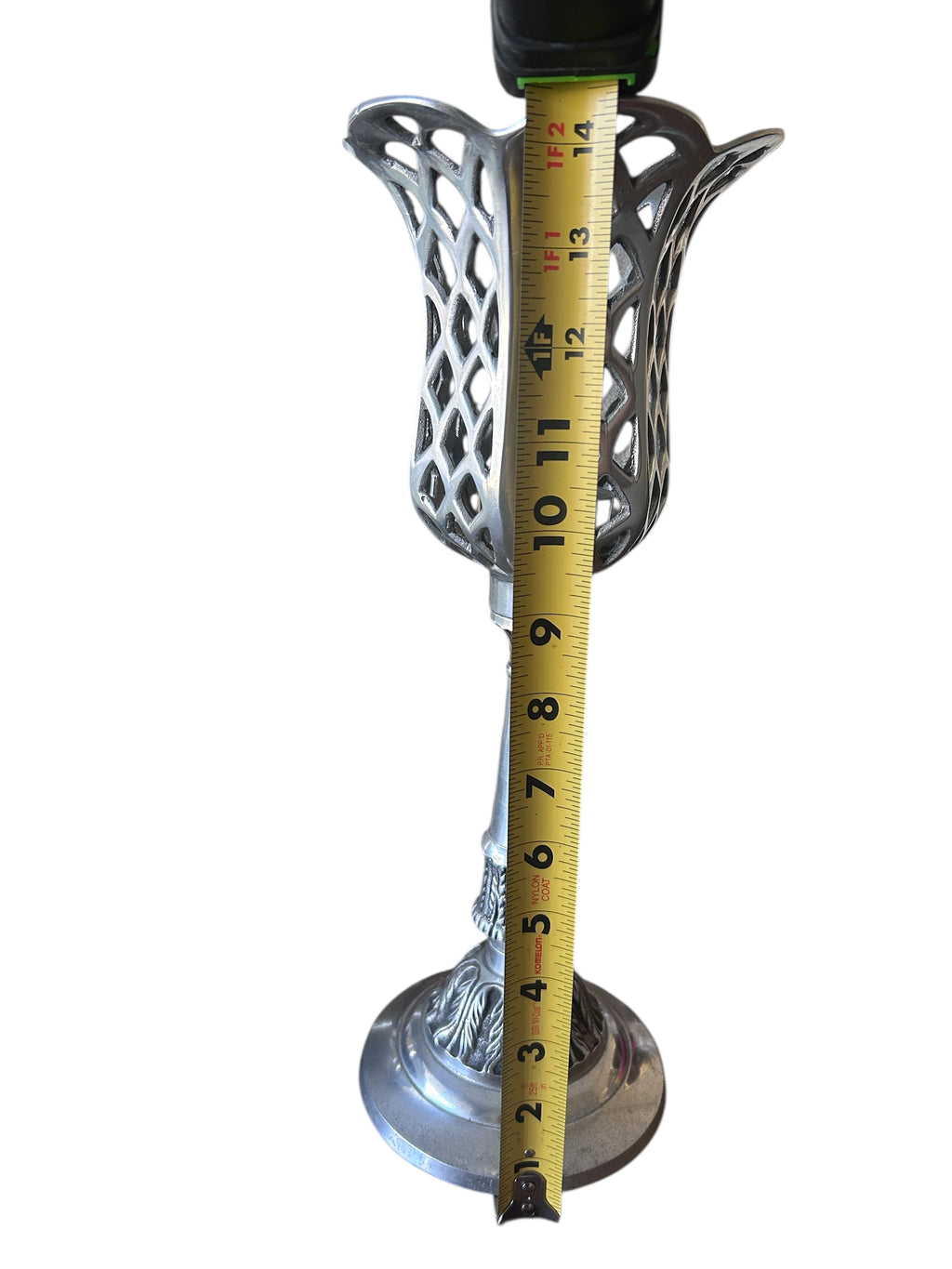 14.5 inch tall metal tea light candle holder. Silver tone.